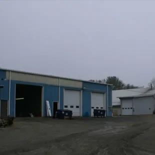 Service garage with large overhead doors